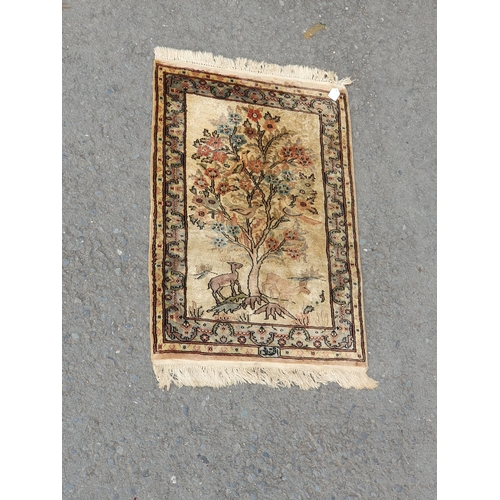 741 - A small Persian Rug on a brown ground, 5ft 8in x 4ft 2in and a small cotton Rug depicting deer besid... 