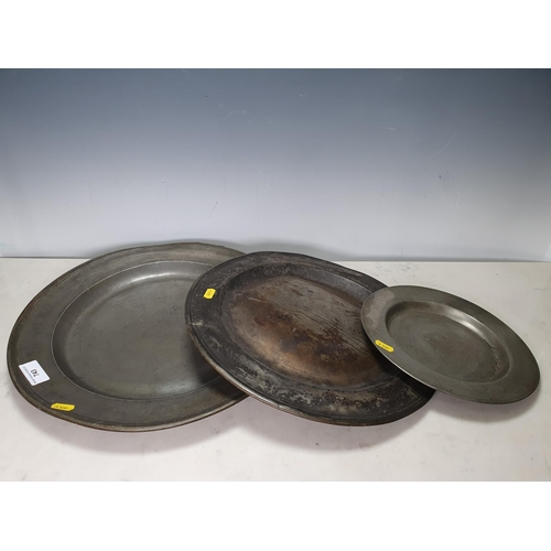 743 - Three pewter Chargers/Plates