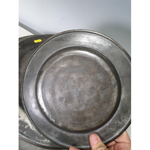 743 - Three pewter Chargers/Plates