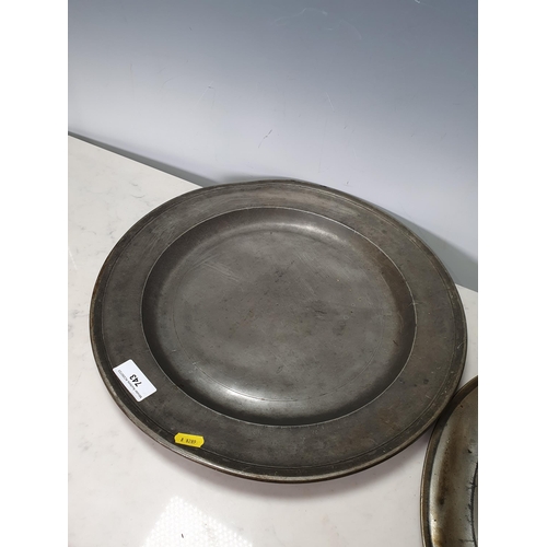 743 - Three pewter Chargers/Plates