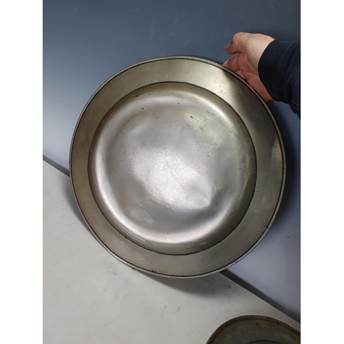 743 - Three pewter Chargers/Plates