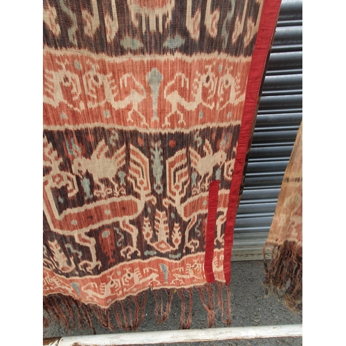 746 - Two Indonesian Ikat Hinggis (bought from Sothebys, Amsterdam in the 1980's), decorated stylised anim... 