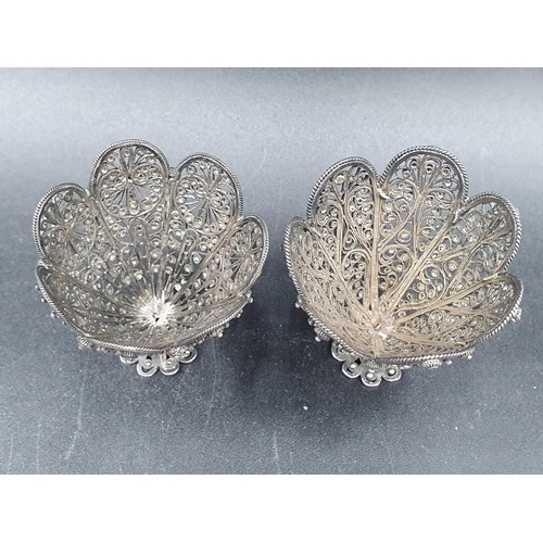 94 - A pair of Turkish filigree Zarfs with scroll and beaded design