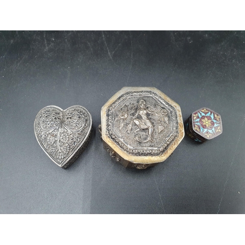 96 - An Indian octagonal Box and Cover embossed and chased figures, a heart shape Box and Cover with flor... 