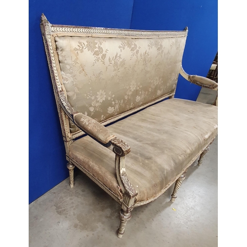 238 - A Louis XVI style Settee with floral upholstered back and seat, leafage carved arms on turned and sp... 