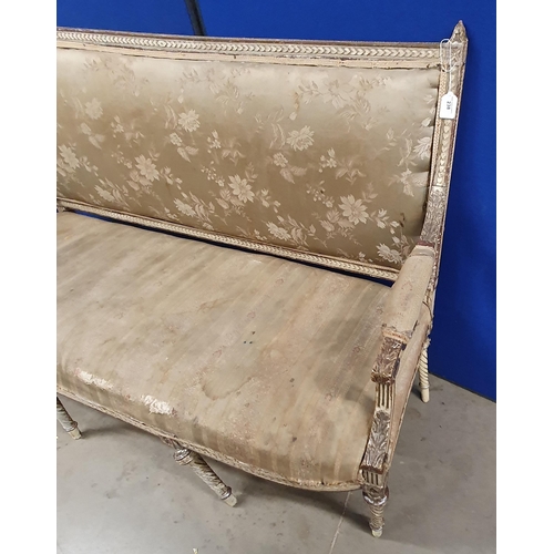 238 - A Louis XVI style Settee with floral upholstered back and seat, leafage carved arms on turned and sp... 