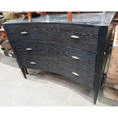 36 - A modern Black Ash veneered concave fronted Chest of three long Drawers.