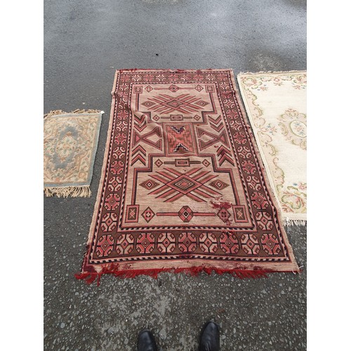 745 - A Chinese Rug, a Persian style Rug with geometric design A/F, and another Rug