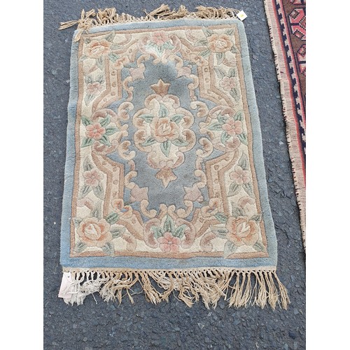 745 - A Chinese Rug, a Persian style Rug with geometric design A/F, and another Rug