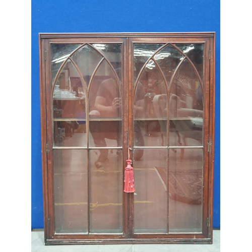 568A - A mahogany Bookcase fitted pair of arched glazed doors  A/F 3ft 7in H x 2ft 11in W