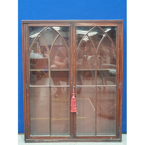 568A - A mahogany Bookcase fitted pair of arched glazed doors  A/F 3ft 7in H x 2ft 11in W