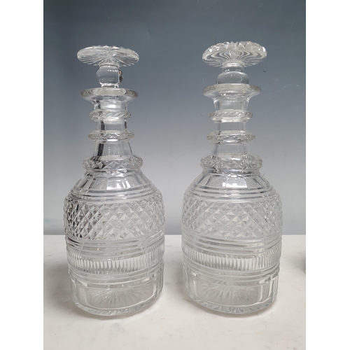 748 - Six assorted cut glass Decanters and stoppers