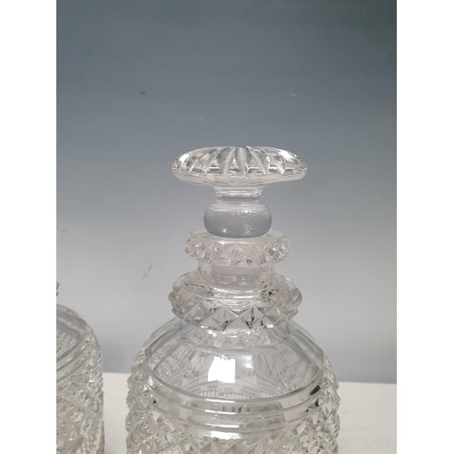 749 - A pair of Georgian cut glass Decanters and stoppers