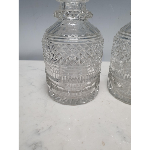 749 - A pair of Georgian cut glass Decanters and stoppers