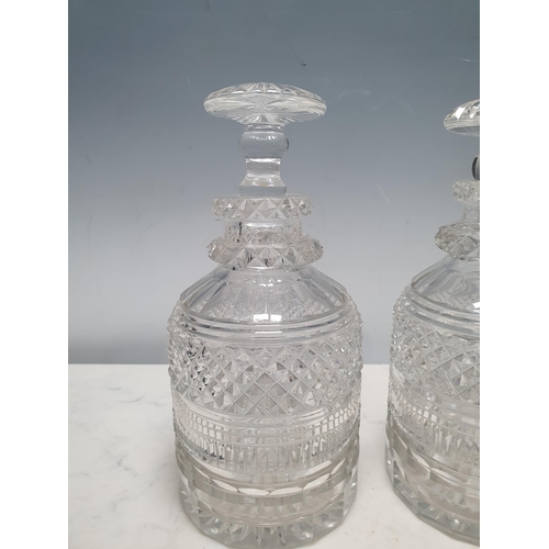 749 - A pair of Georgian cut glass Decanters and stoppers