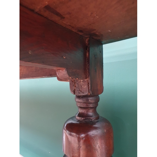 770 - An antique oak Refectory Table with 17th Century elements, having a three plank cleated top, raised ... 