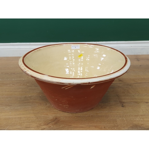 1 - A Terracotta cream glazed Dairy Bowl, (glaze worn in places), 20