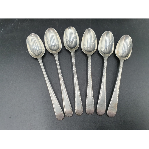 112 - Six Georgian silver bottom marked Teaspoons with feather edges