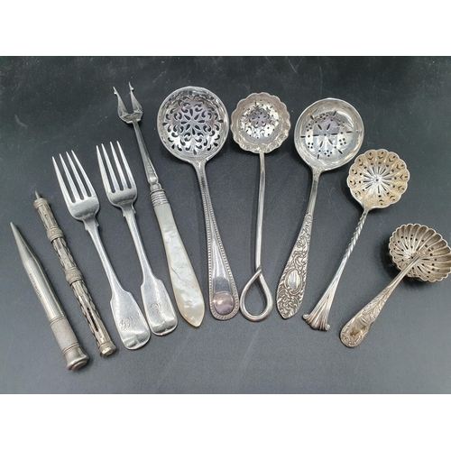 114 - Two silver Sifting Spoons, one A/F, three plated, two small silver Forks, Pickle Fork, Birmingham 18... 