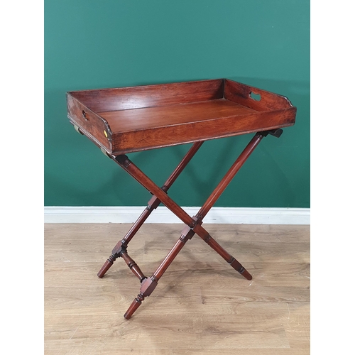 12 - A 19th Century mahogany Butlers Tray on turned folding stand, 2ft 10