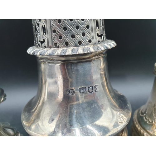 139 - A Victorian silver Sugar Caster of urn shape with strapwork frieze, London 1899, 240gms, and two pla... 