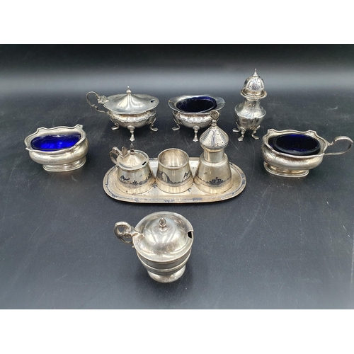 141 - A Niello three piece Condiment Set on oval Tray decorated camels, sailing vessels, etc, and six silv... 