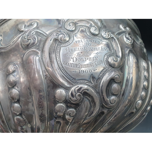 142 - A Victorian silver Rose Bowl with gadroon and floral embossing, engraved presentation inscription, C... 