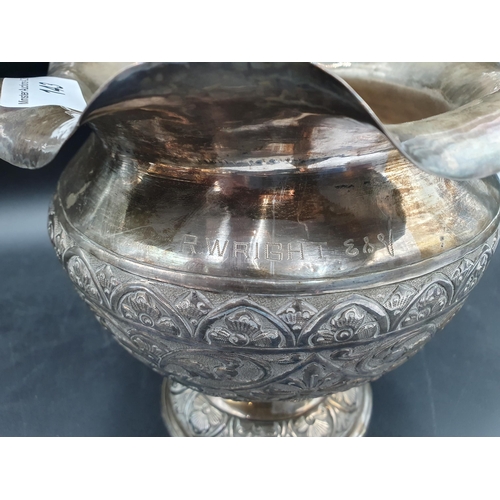 143 - An Indian silver Bowl embossed frieze of animals, 5in, and a white metal Pedestal Bowl with leafage ... 