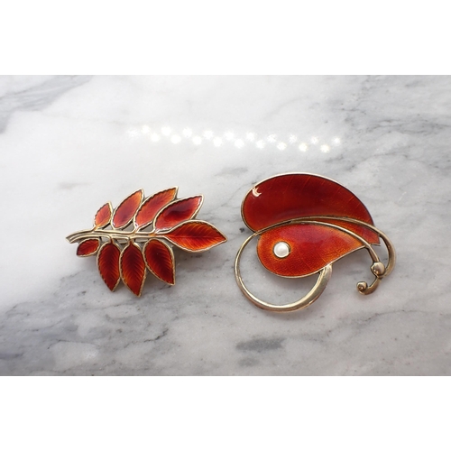 175 - Two Norwegian silver and red enamel Leaf Brooches