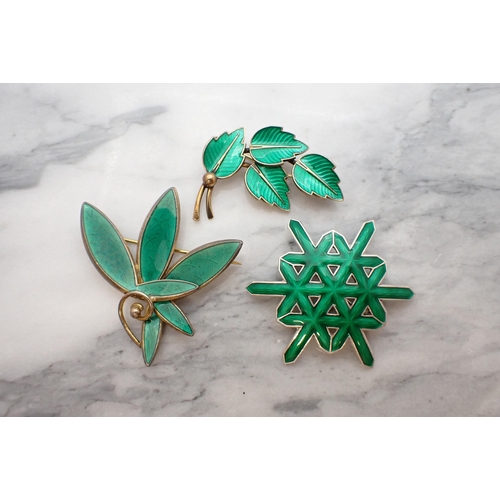 176 - Two Norwegian silver and green enamel modernist Brooches and a Danish silver and green enamel Leaf B... 