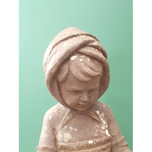 18 - An antique cast iron Figure of a young girl holding a basket, 2ft 10in H