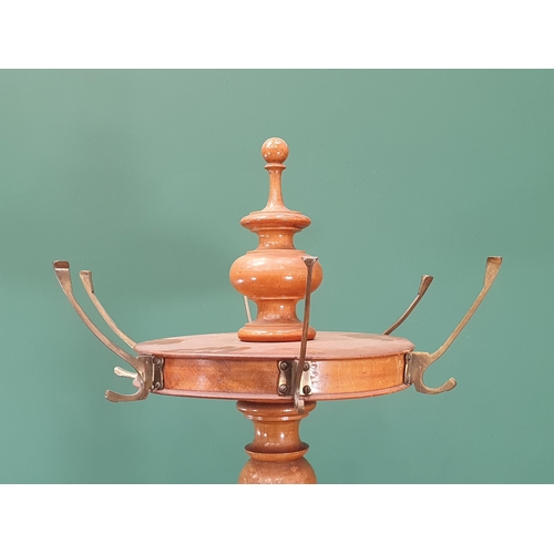 20 - A 19th Century turned Beech Coat/Hat Stand, the top with turned finial above six brass coat hooks, a... 