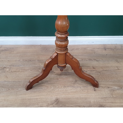 20 - A 19th Century turned Beech Coat/Hat Stand, the top with turned finial above six brass coat hooks, a... 