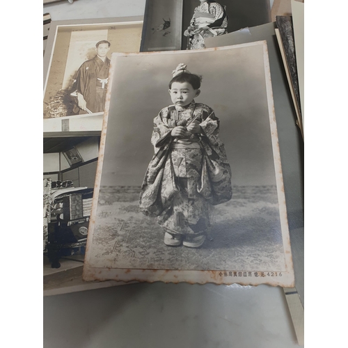 214 - A collection of Japanese Photographs, mostly portraits