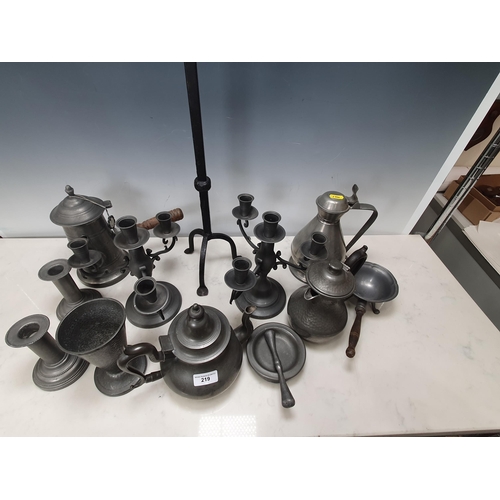 219 - A wrought iron Candle Stand and a quantity of pewter including, Teapot, Hot Water Jug, Candlesticks,... 