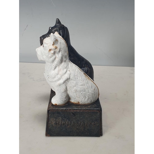 229 - A cast iron 'Black and White Scotch Whisky' Advertising Figure with two Scottie dogs, 6in H x 5 1/2i... 