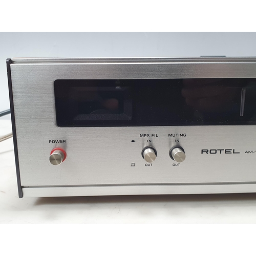 23 - A Pioneer PL-12D Belt Drive Turntable, a Rotel RD-500 Stereo Cassette Tape Deck, a Rotel RA-610 Soli... 