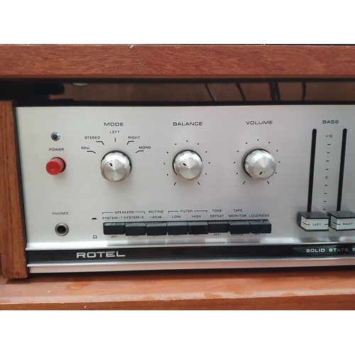 23 - A Pioneer PL-12D Belt Drive Turntable, a Rotel RD-500 Stereo Cassette Tape Deck, a Rotel RA-610 Soli... 