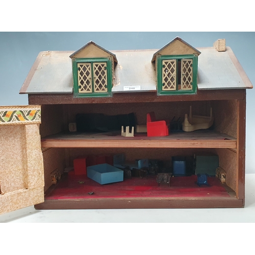 248 - A painted chipboard Doll's House, 14