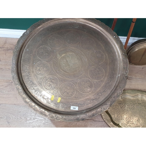 250 - A folding brass Tray Top Table, an oval brass Tray, a Warming Pan, and two Walking Sticks.