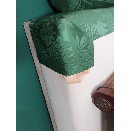 264 - A French style Day Bed with scrolled ends, floral green upholstery, the side rails mounted with bras... 