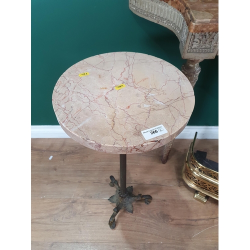 266 - An antique pierced brass Fender, 3ft 5in W, a marble top Wine Table with griffin support on the flut... 