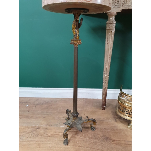 266 - An antique pierced brass Fender, 3ft 5in W, a marble top Wine Table with griffin support on the flut... 