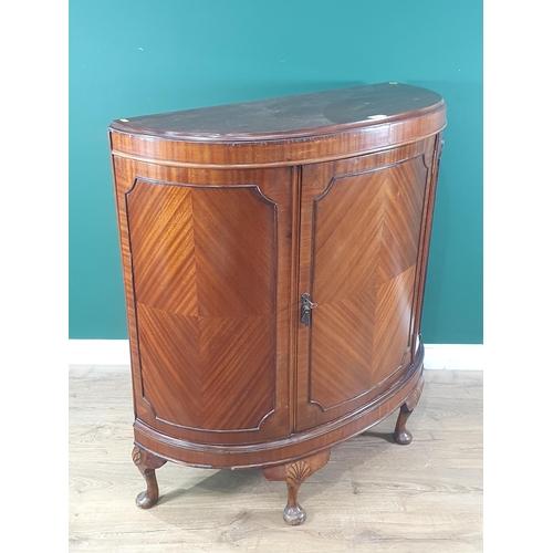 270 - A mahogany bow front Cupboard/Drinks Cabinet fitted shelf interior raised on cabriole supports, A/F,... 