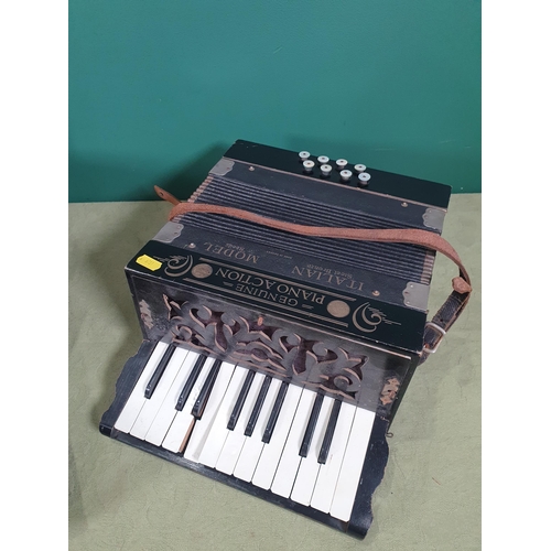 275 - A Galotta cased Accordion and a Genuine Piano Action Italian Model Steel Bronze Reeds.