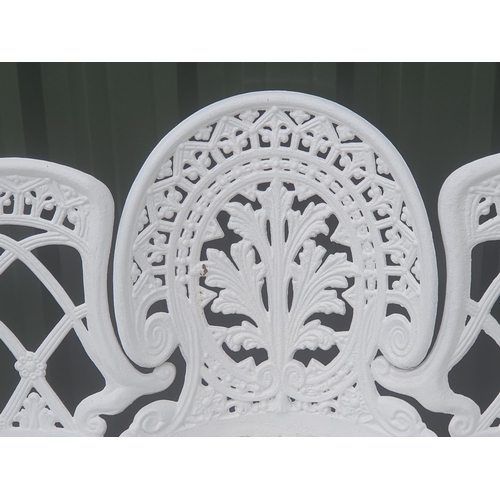 292 - A white painted aluminium three seater Garden Bench/Seat with pierced leafage and floral design back... 