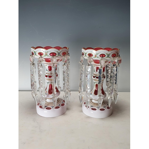 311 - A pair of overlaid red glass Table Lustres with clear glass prismatic drops, 9 1/2 in H