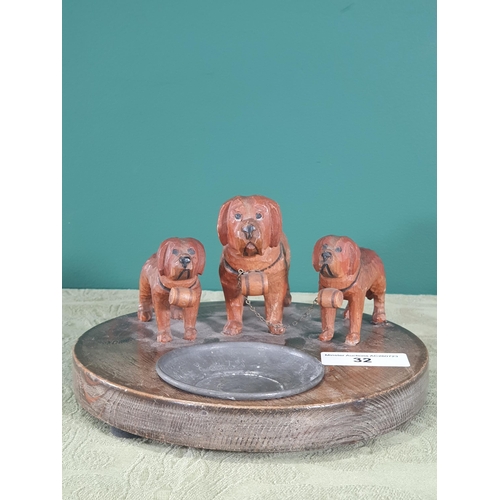 32 - A wooden Ashtray with three carved St Bernards with small pewter Norwegian Dish with Viking Longship... 