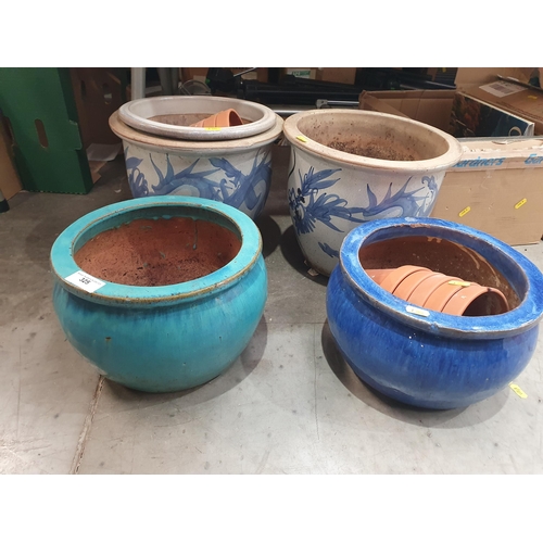 325 - A pair of blue and white Flower Pots, glazed Flower Pots, terracotta Flower Pots, etc