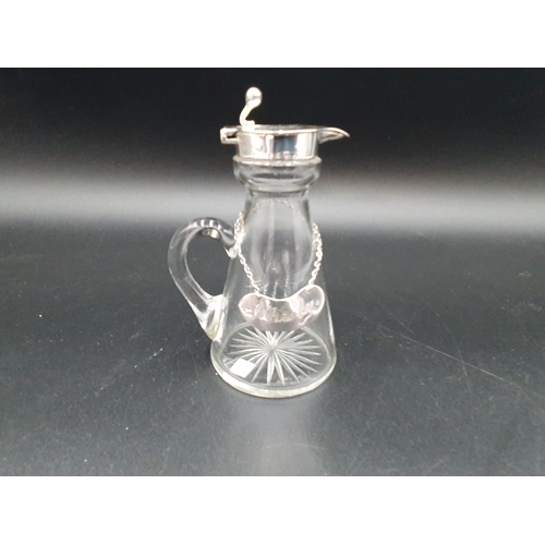 35 - A George V silver mounted and lidded cut glass Toddy Flask, Birmingham 1910 with a Whisky Label, Lon... 